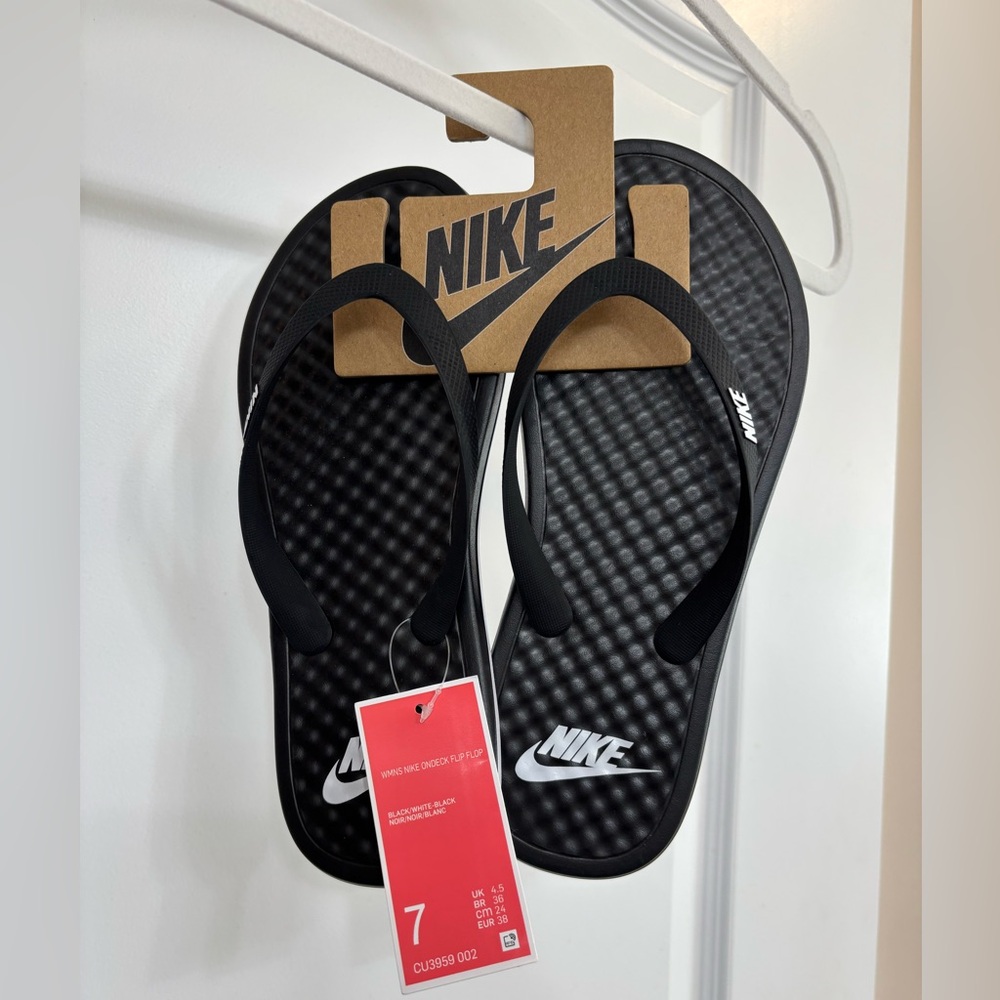Black Nike flip flops